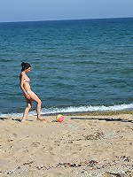 Girls fooling around on the beach